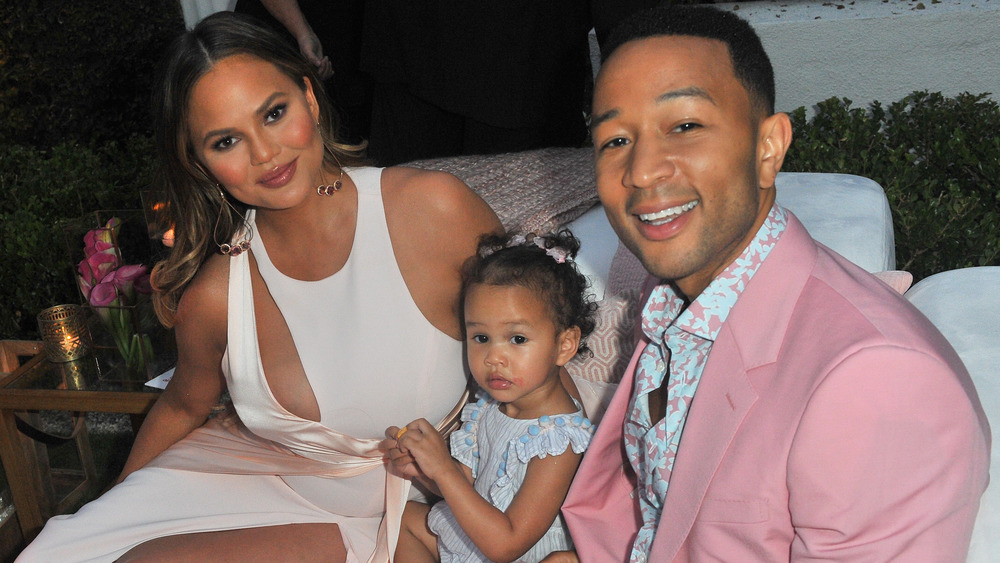 Chrissy Teigen and John Legend with daughter Luna