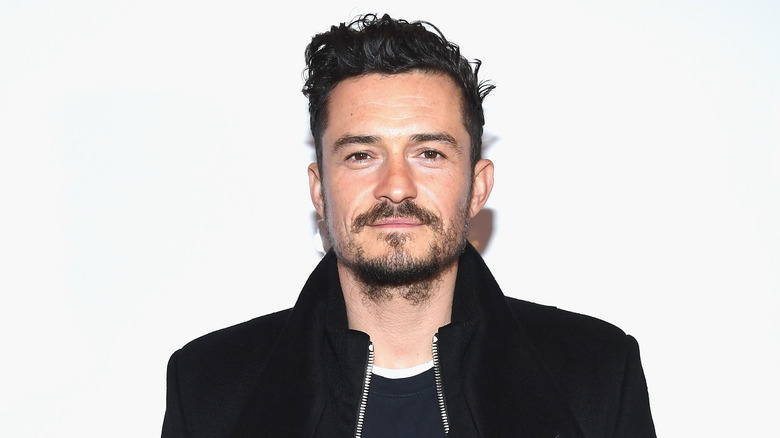 Orlando Bloom black jacket