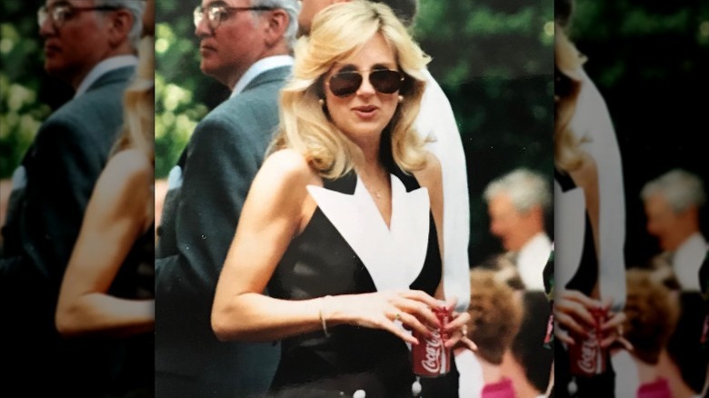 Jill Biden poses in aviator glasses and a black dress