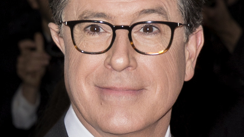 Stephen Colbert smiling on red carpet