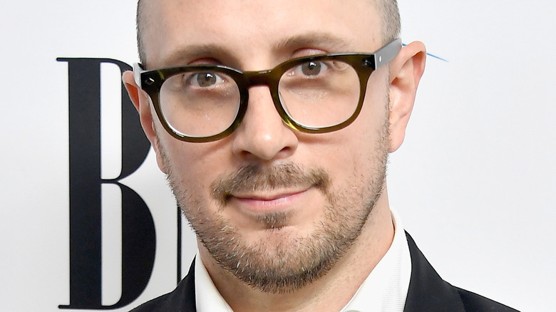 Steve Burns posing in glasses