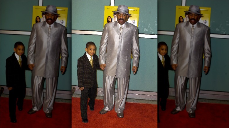 Steve Harvey holds young Wynton's hand