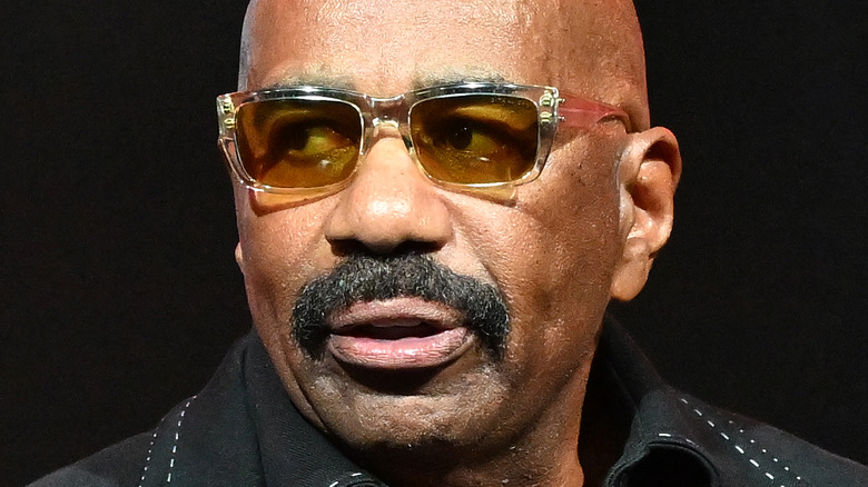 Steve Harvey tinted glasses
