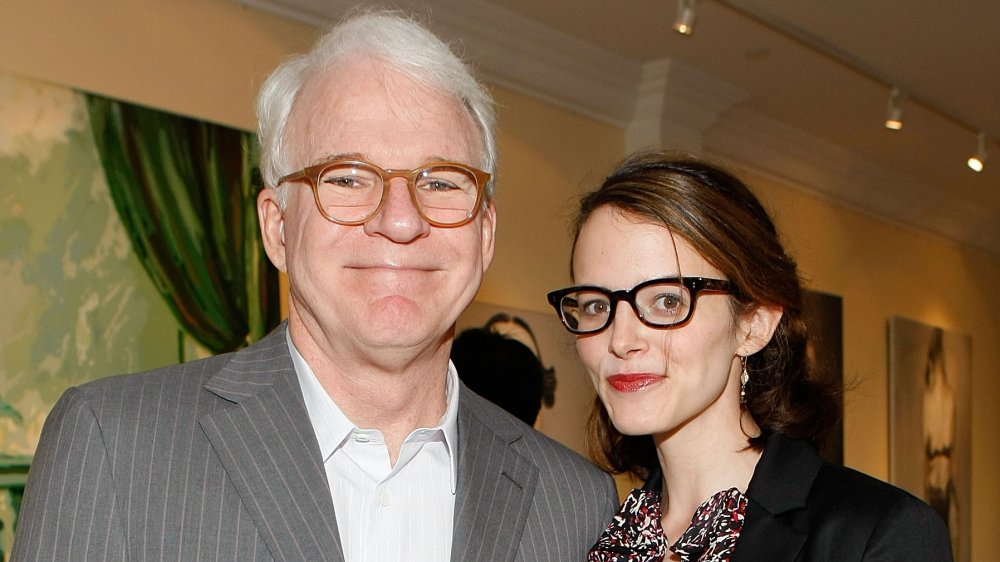 Actor and musician Steve Martin (L) and wife Anne Stringfield attend the presentation of "Wounded" curated by Carole Bayer Sager at LA Art House