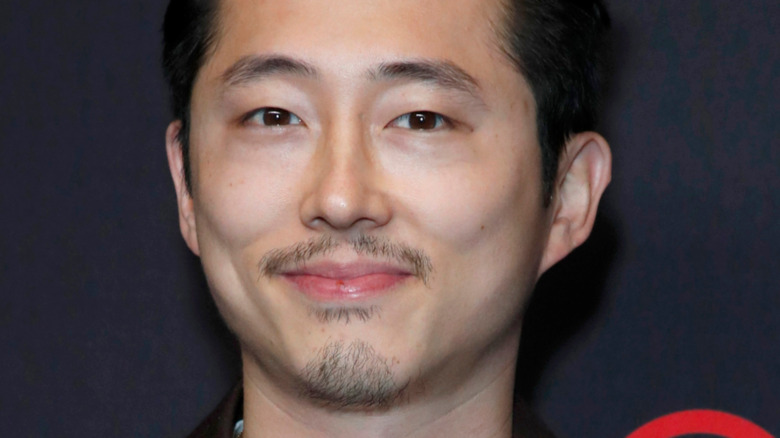 Steven Yeun smiling