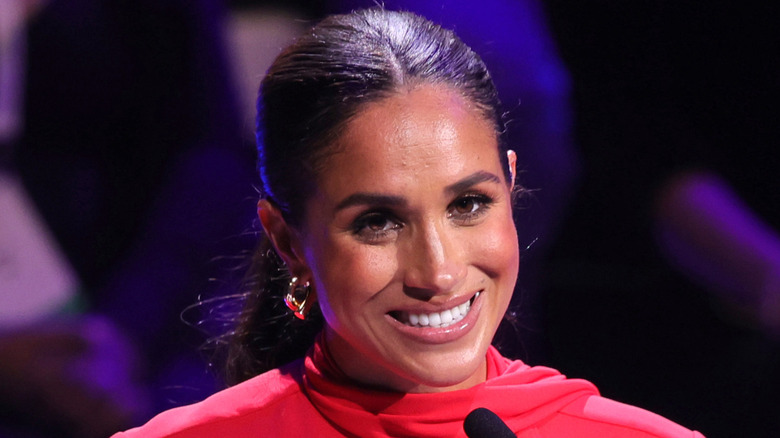 Meghan Markle, smiling at an event