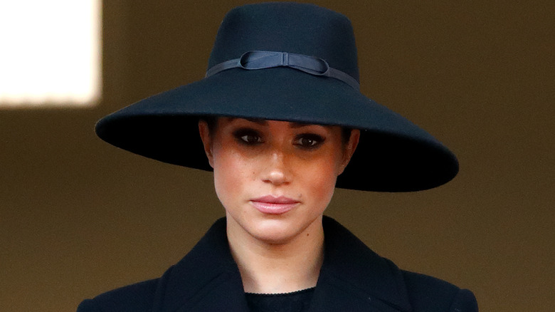 Meghan Markle wearing an all black outfit