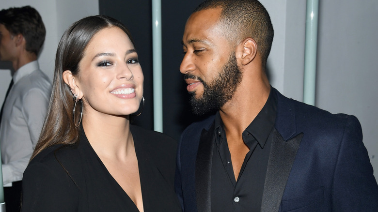 Ashley Graham smiling with Justin Ervin