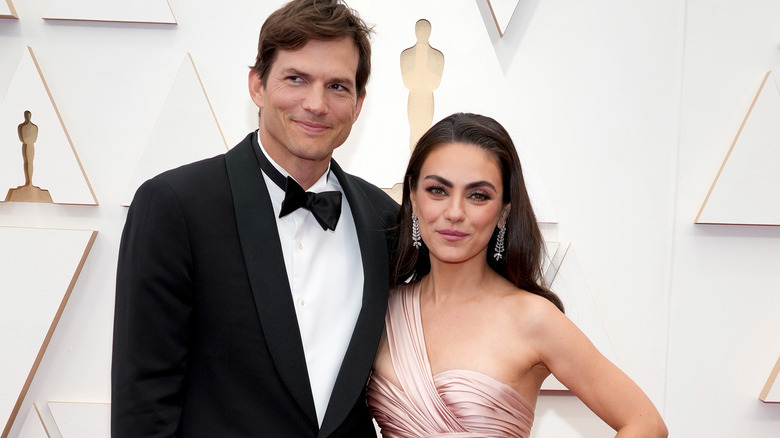 Ashton Kutcher and Mila Kunis smiling together