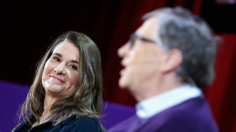 Melinda Gates looking at Bill Gates speak