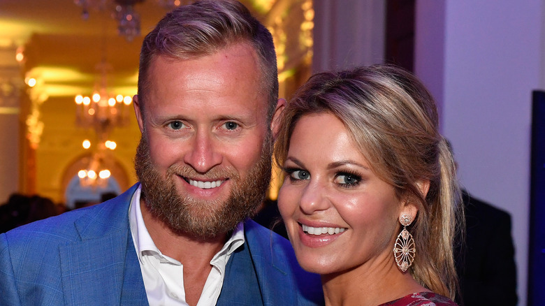 Valeri Bure and Candace Cameron Bure smile