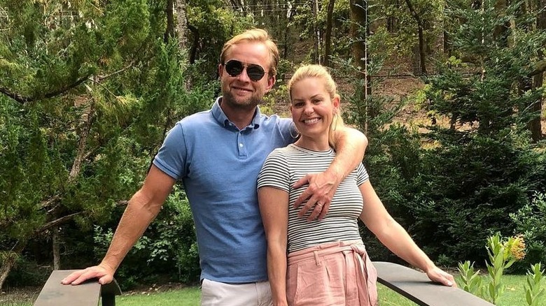 Valeri Bure touches Candace Cameron Bure's chest