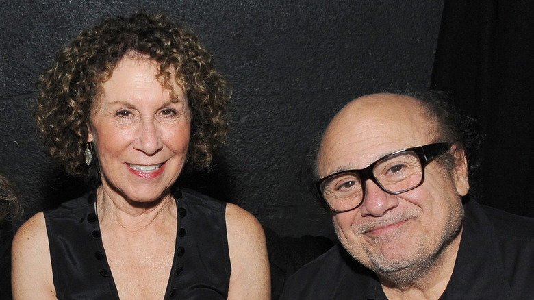 Rhea Perlman and Danny DeVito sit together