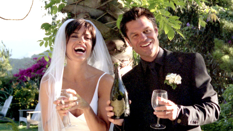 Lisa Rinna, Harry Hamlin smiling on their wedding day in 1997