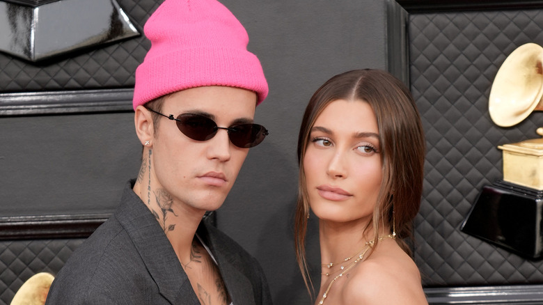 Justin and Hailey Bieber posing at the Grammys