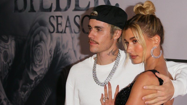 Justin and Hailey Bieber posing