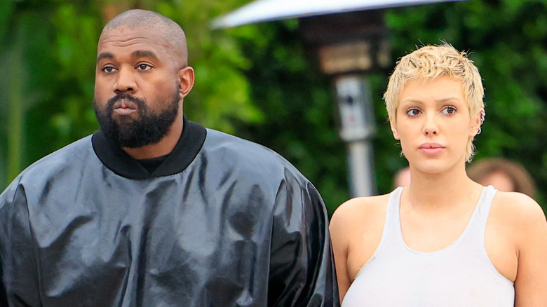 Kanye West and Bianca Censori walking