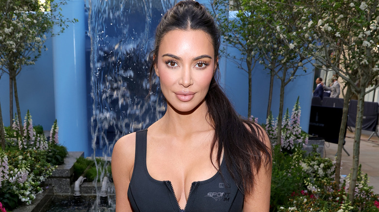 Kim Kardashian posing at SKIMS store