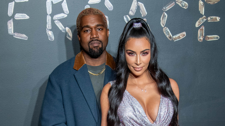 Kim Kardashian posing with Kanye West