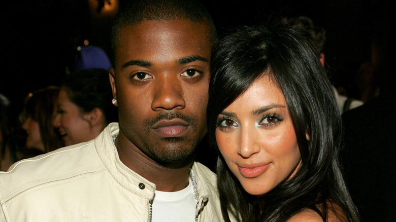 Kim Kardashian posing with Ray J