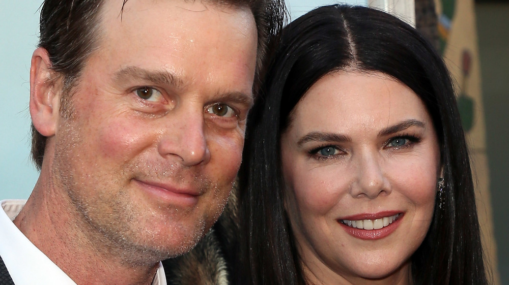 Lauren Graham and Peter Krause smile 