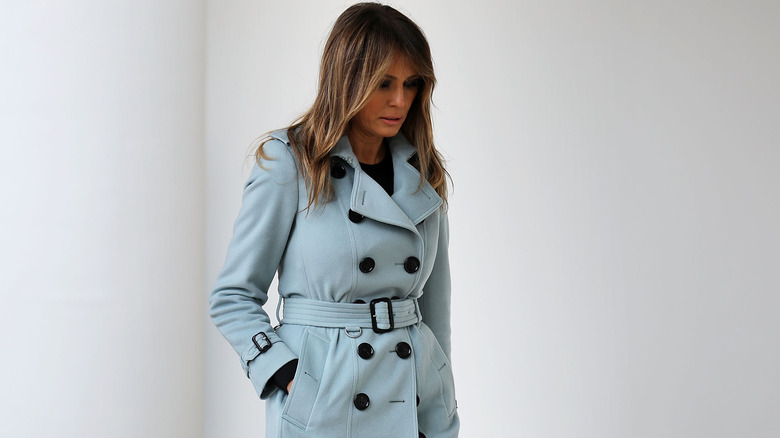 Melania Trump head down walking