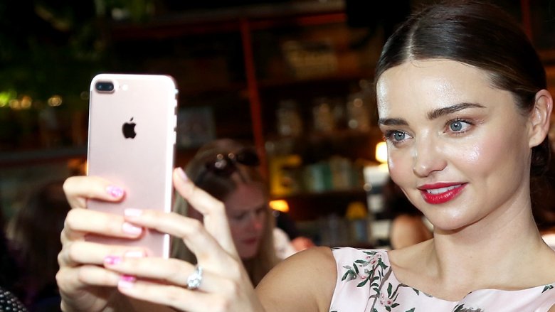 Miranda Kerr taking a selfie