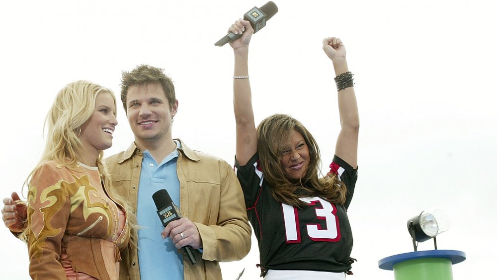Jessica Simpson, Nick Lachey, and Vanessa Minnillo at MTV's Total Request Live on Super Bowl Sunday in 2004