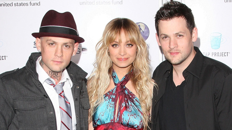Benji Madden, Nicole Richie, and Joel Madden posing together