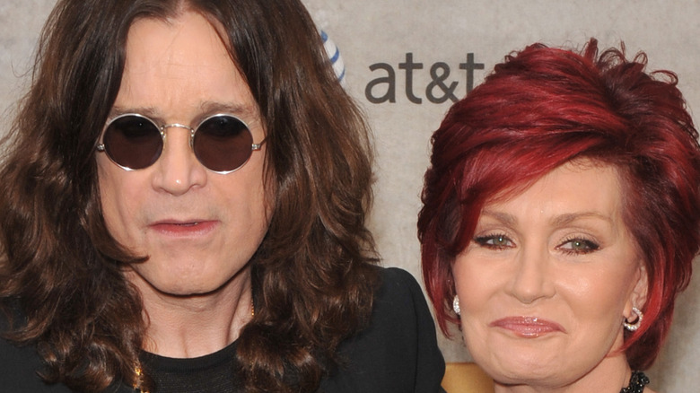 Ozzy and Sharon Osbourne pose on red carpet 