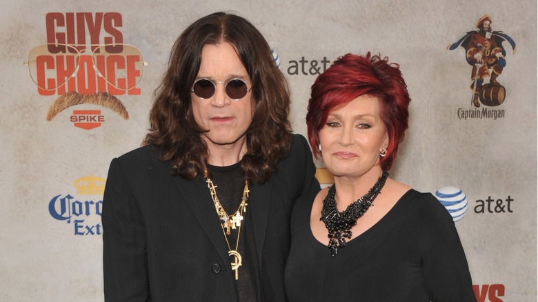 Ozzy and Sharon Osbourne pose on red carpet