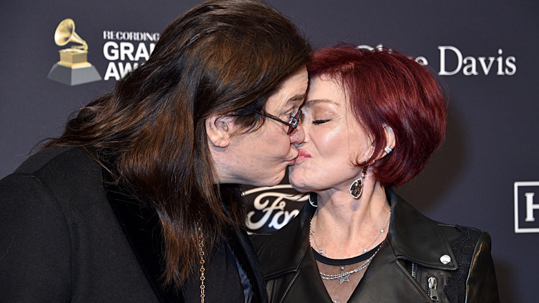 Ozzy Osbourne and Sharon Osbourne kissing