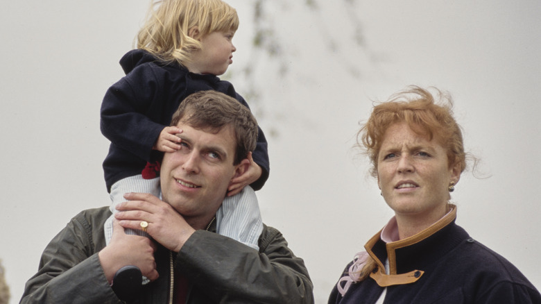 Princess Beatrice on Prince Andrew's shoulders, Sarah Ferguson serious