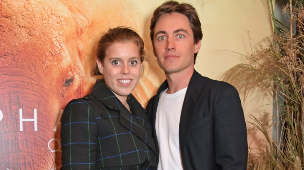 Princess Beatrice smiling and posing with husband Edoardo Mapelli Mozzi