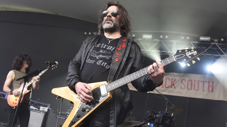 John Cusimano perfomring guitar on stage