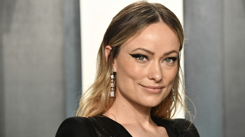 Olivia Wilde smirking