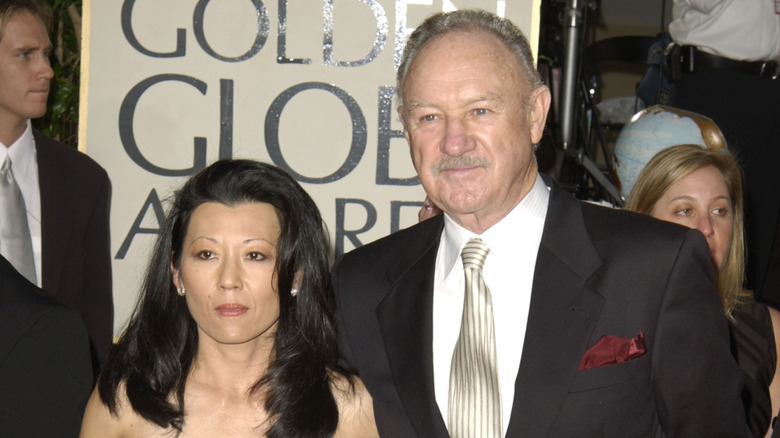 Gene Hackman and Betsy Arakawa, posing at the Golden Globes Award