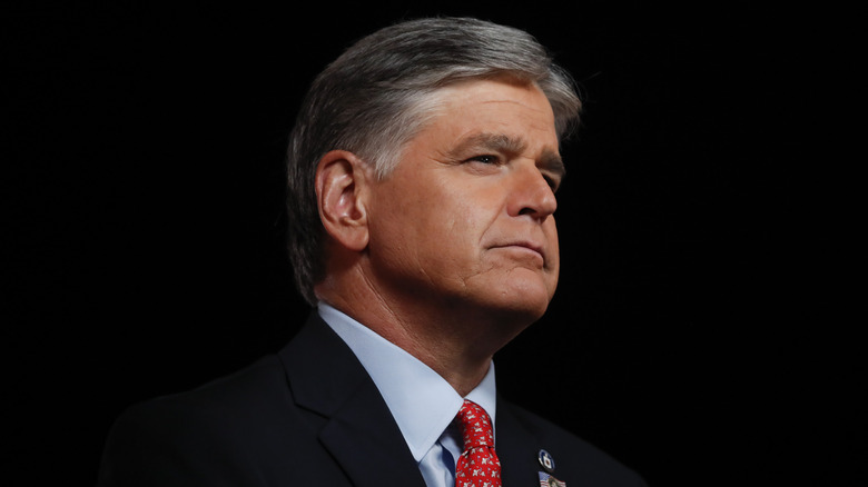 Sean Hannity against black background