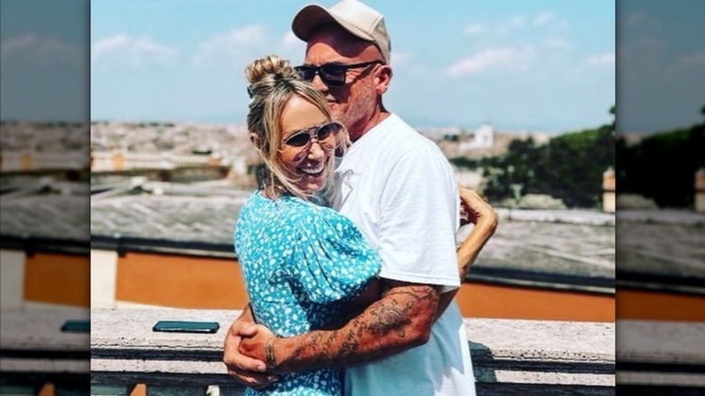 Dominic Purcell hugging Tish Cyrus