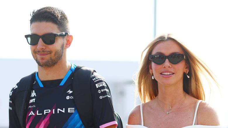 Flavy Barla walking with Esteban Ocon in Monza, Italy, in September 2024