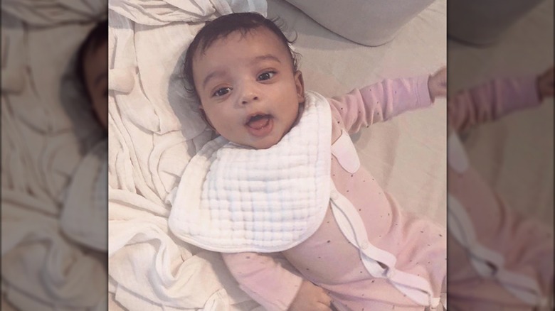 Baby Chicago West in crib