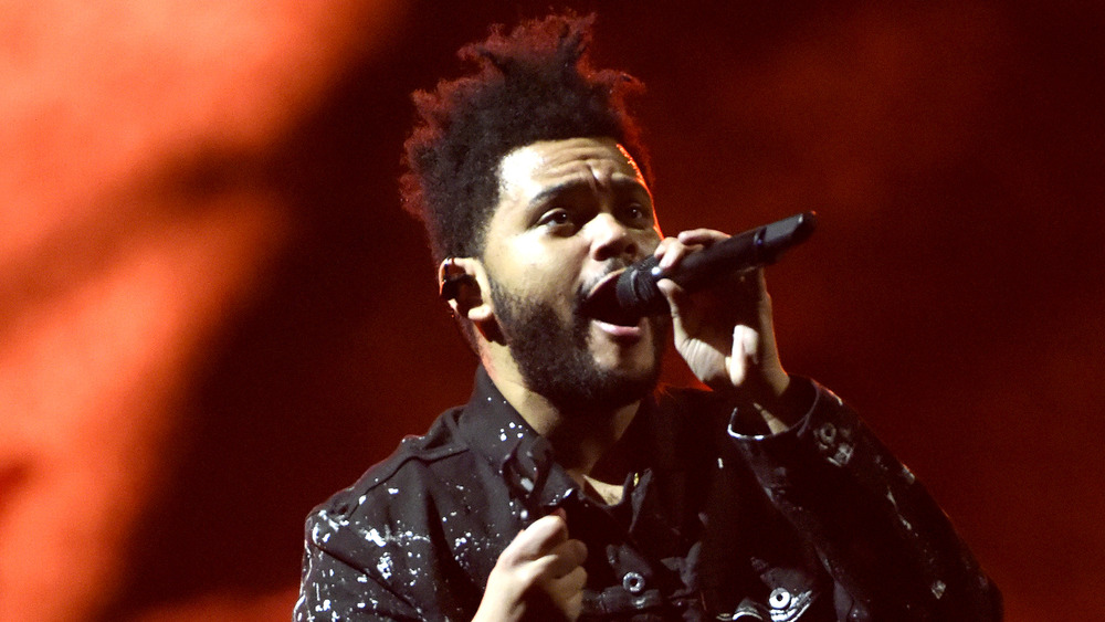 The Weeknd performing at a concert