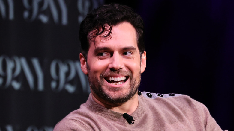 Henry Cavill wearing beige sweater