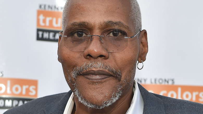 Bill Nunn wearing glasses and earring