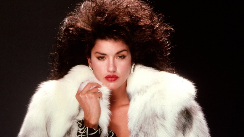 Janice Dickinson wearing white fur