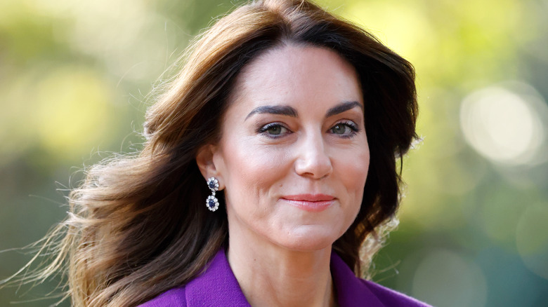 Kate Middleton smiling outdoors in close-up