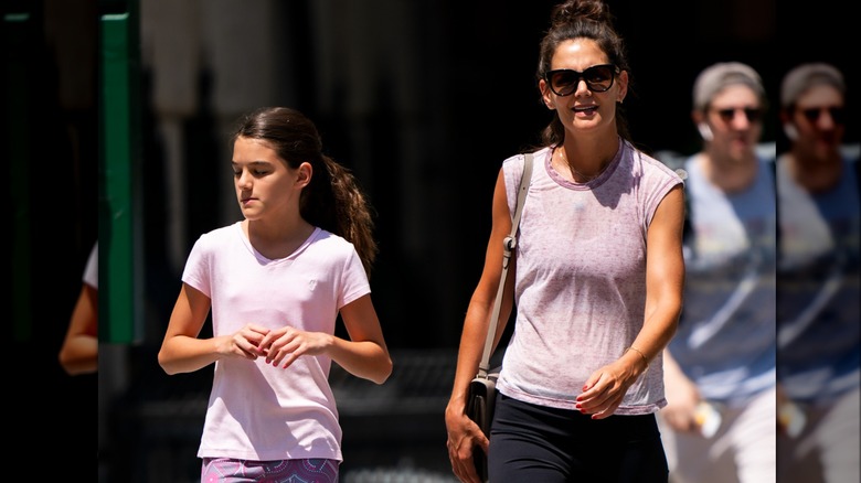 Suri Cruise Katie Holmes walking