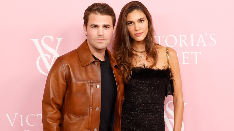 Paul Wesley and Natalie Kuckenburg on the red carpet