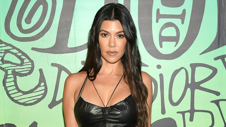 Kourtney Kardashian posing