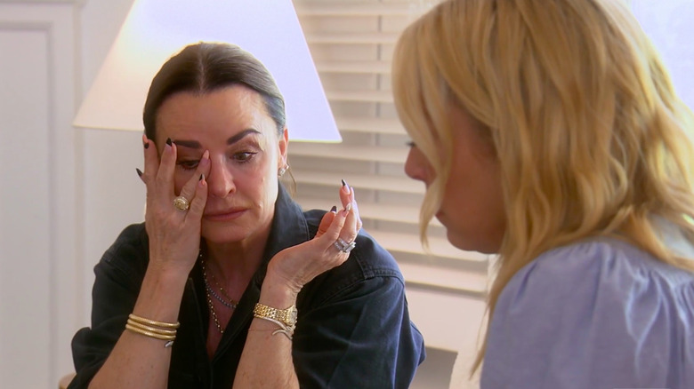 Kyle Richards wiping tears